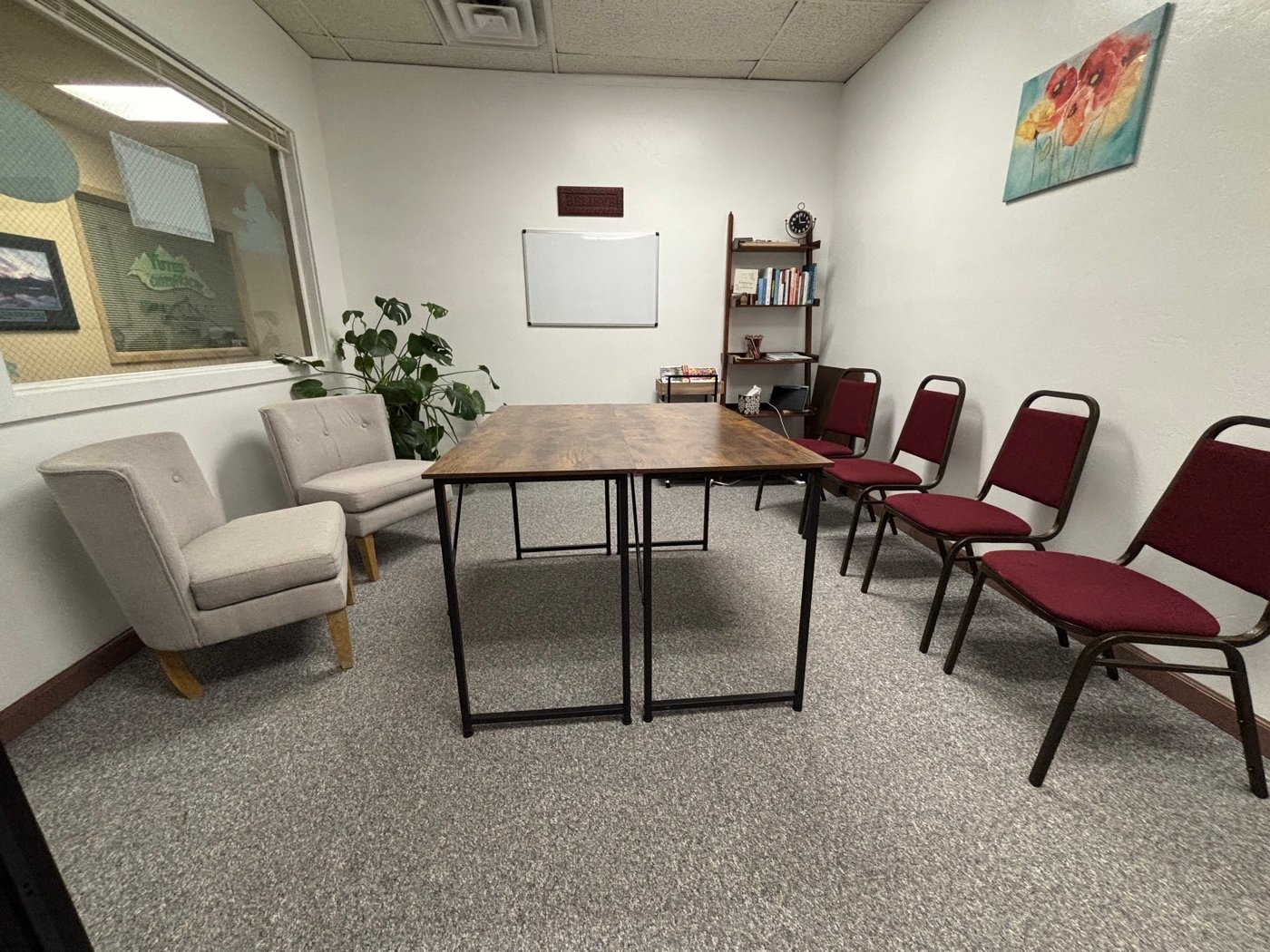 The gathering room with chairs arranged for a group session